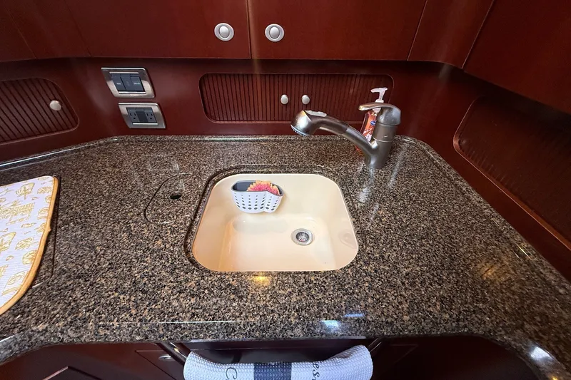 Slide: The Image of Granite countertop with sink in 2007 Sea Ray 40 Motor Yacht kitchen. - 67