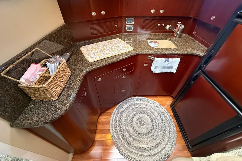 Slide: The Image of Luxurious kitchen area in 2007 Sea Ray 40 Motor Yacht with granite countertops. - 66