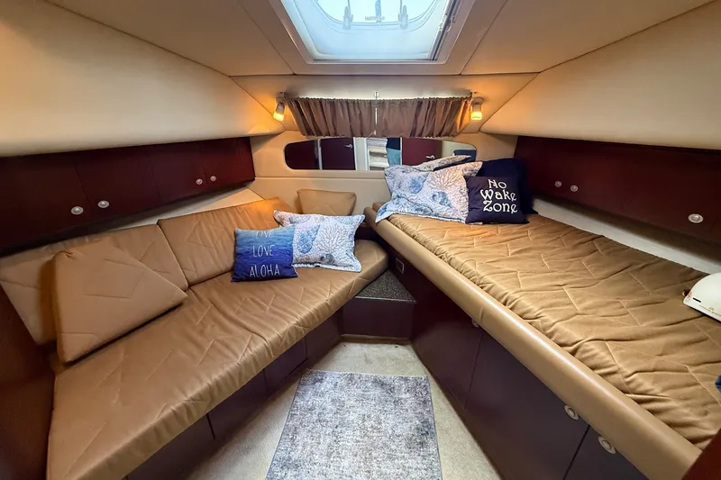 Slide: The Image of Luxurious 2007 Sea Ray 40 Motor Yacht cabin with cozy bedding and decorative pillows. - 77