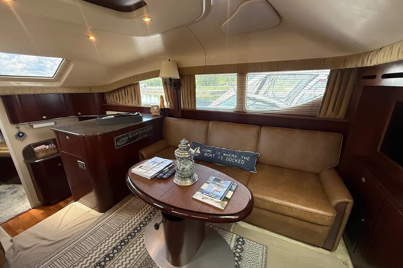Slide: The Image of Luxurious interior of 2007 Sea Ray 40 Motor Yacht with cozy seating and elegant decor. - 54