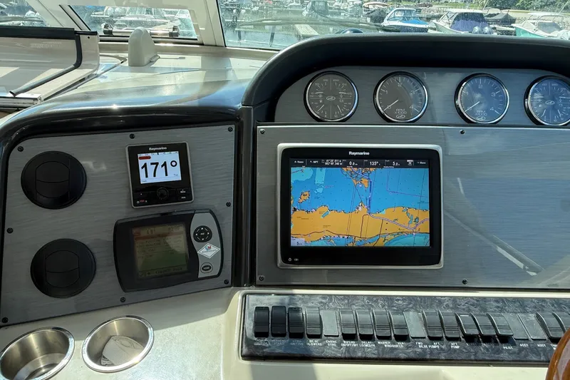 Slide: The Image of Dashboard of a 2007 Sea Ray 40 Motor Yacht with navigation instruments. - 47