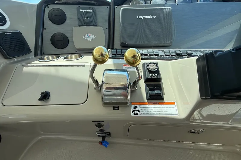 Slide: The Image of Control panel of a 2007 Sea Ray 40 Motor Yacht with Raymarine equipment. - 43
