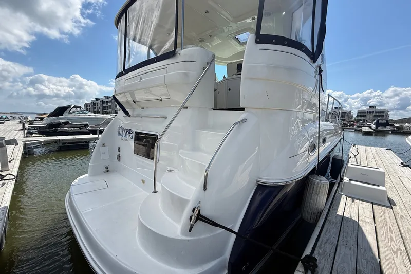 Slide: The Image of 2007 Sea Ray 40 Motor Yacht docked at marina under blue sky. - 8