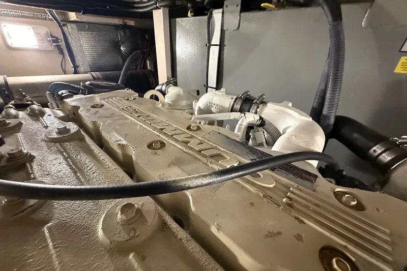 Slide: The Image of Engine compartment of a 2007 Sea Ray 40 Motor Yacht, showcasing mechanical components. - 108