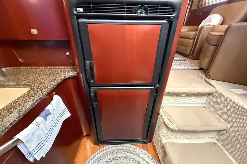 Slide: The Image of Interior of 2007 Sea Ray 40 Motor Yacht with fridge and stairs. - 69