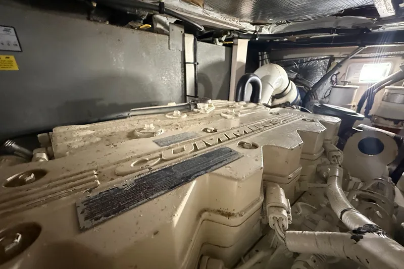 Slide: The Image of Engine room of a 2007 Sea Ray 40 Motor Yacht, featuring a Cummins engine. - 107