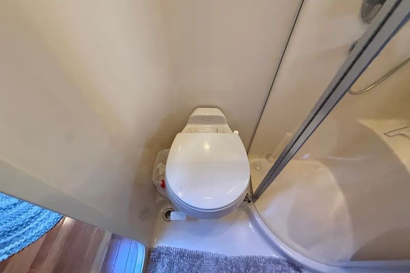 Slide: The Image of Bathroom interior of 2007 Sea Ray 40 Motor Yacht with toilet and shower. - 74