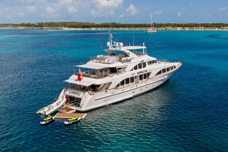 Slide: The Image of Luxurious 2007 Benetti 120 Classic yacht anchored in clear blue waters. - 3