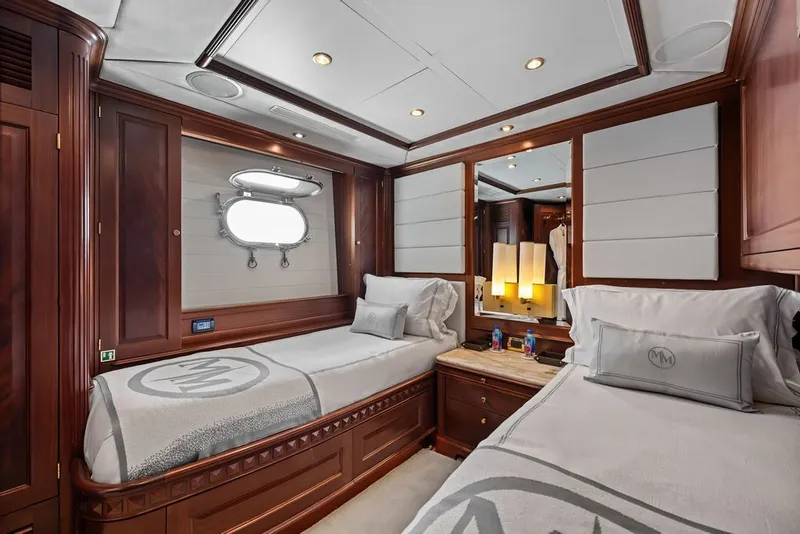 Slide: The Image of Luxurious twin cabin interior of 2007 Benetti 120 Classic yacht with elegant wood finishes. - 131