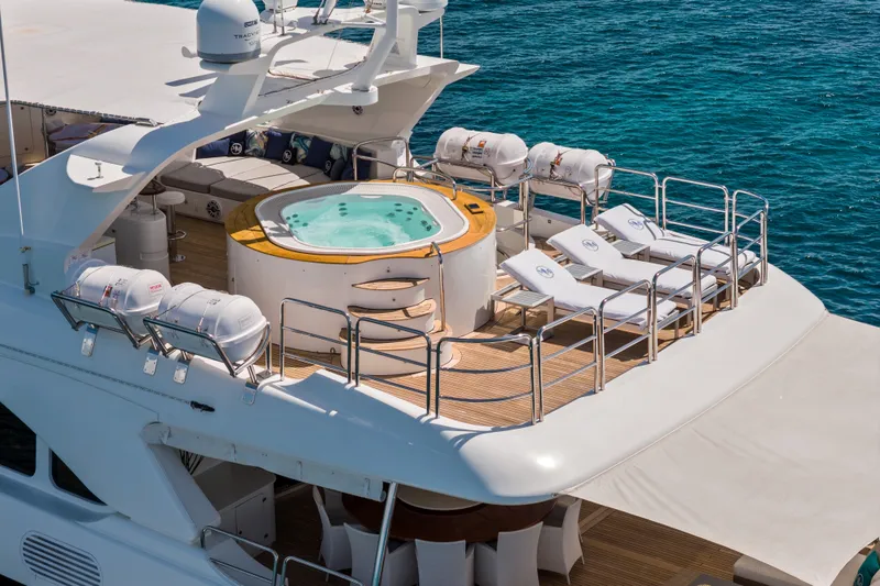 Slide: The Image of Luxurious 2007 Benetti 120 Classic yacht with jacuzzi and sun loungers on deck. - 5