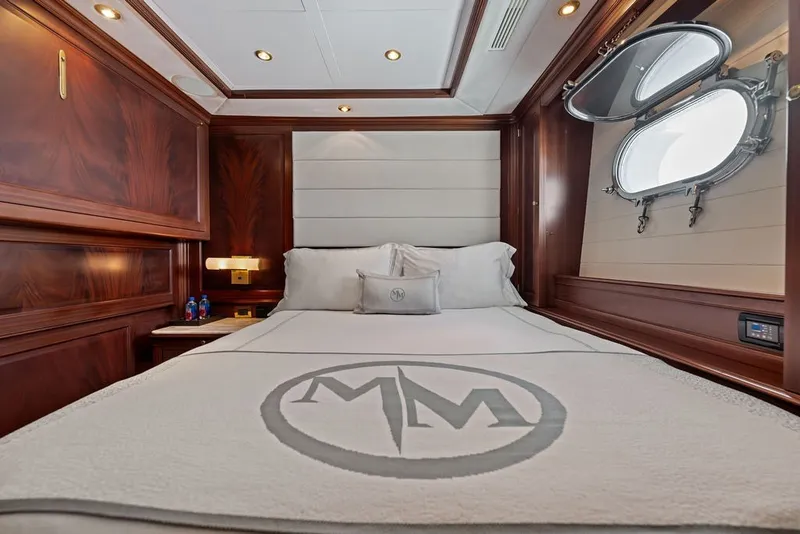 Slide: The Image of Luxurious cabin interior of 2007 Benetti 120 Classic yacht with elegant wood paneling. - 126