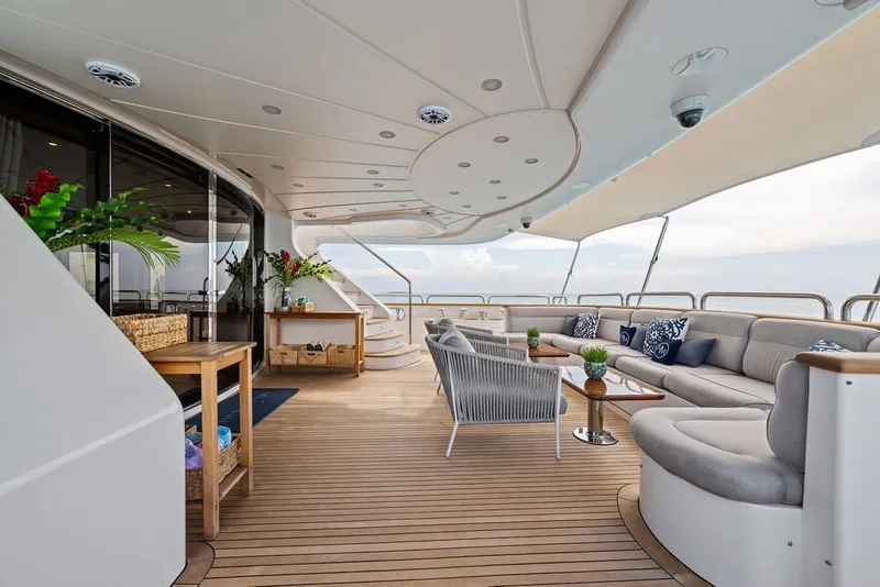 Slide: The Image of Luxurious deck of 2007 Benetti 120 Classic yacht with elegant seating and decor. - 23