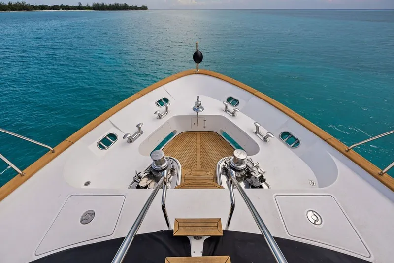 Slide: The Image of Bow view of 2007 Benetti 120 Classic yacht on tranquil blue waters. - 19