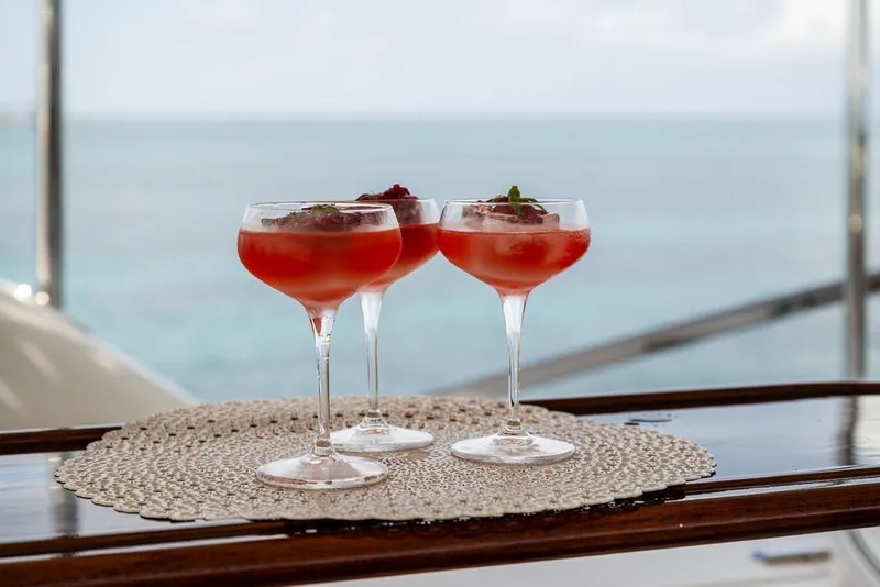 Slide: The Image of Three cocktails on a Benetti 120 Classic yacht, ocean view, 2007 model. - 141