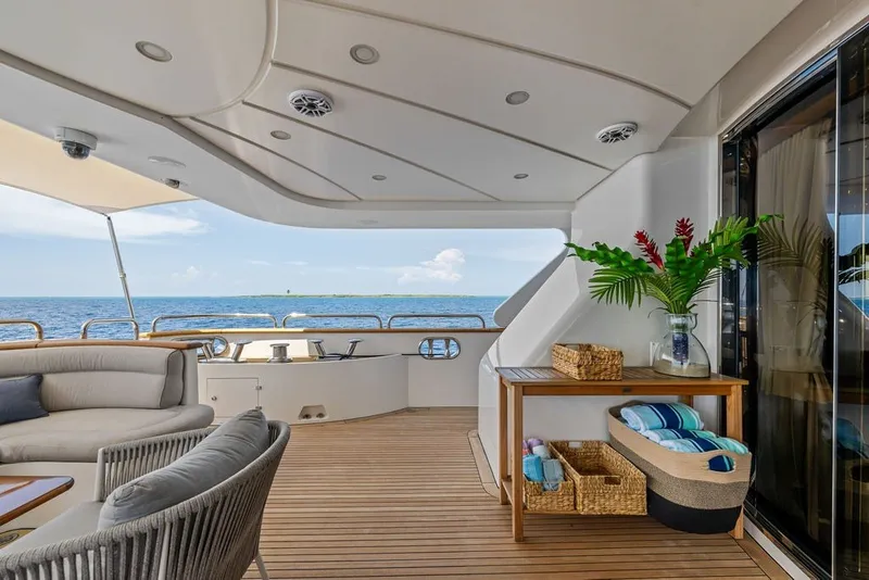 Slide: The Image of Luxurious Benetti 120 Classic yacht deck with elegant seating and ocean view, 2007 model. - 26