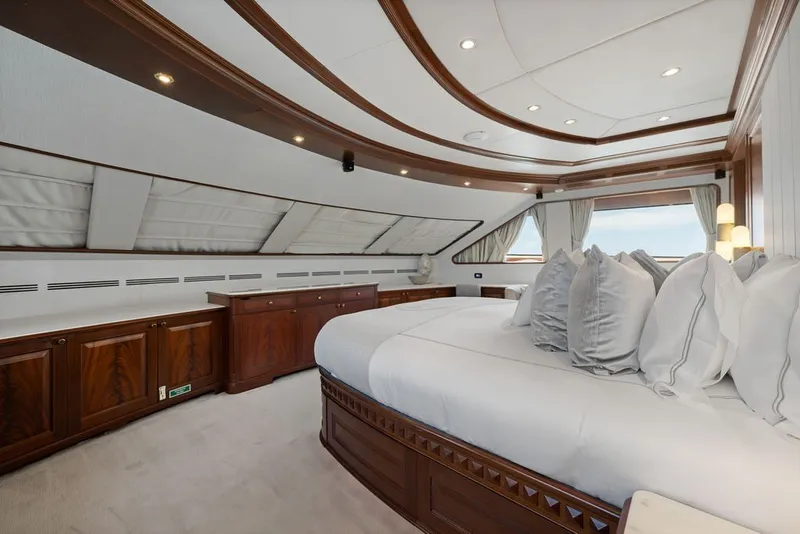 Slide: The Image of Luxurious bedroom interior of 2007 Benetti 120 Classic yacht with elegant wood finishes. - 102