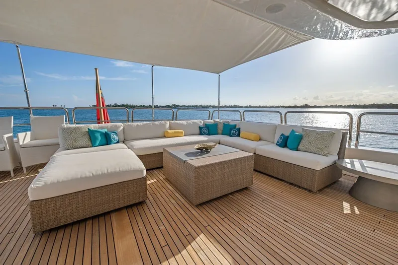 Slide: The Image of Luxurious outdoor seating on 2007 Benetti 120 Classic yacht, overlooking serene ocean view. - 39