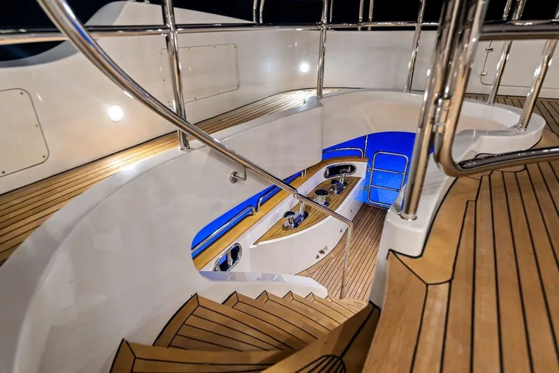 Slide: The Image of Luxurious Benetti 120 Classic yacht interior with elegant wooden staircase, 2007 model. - 40