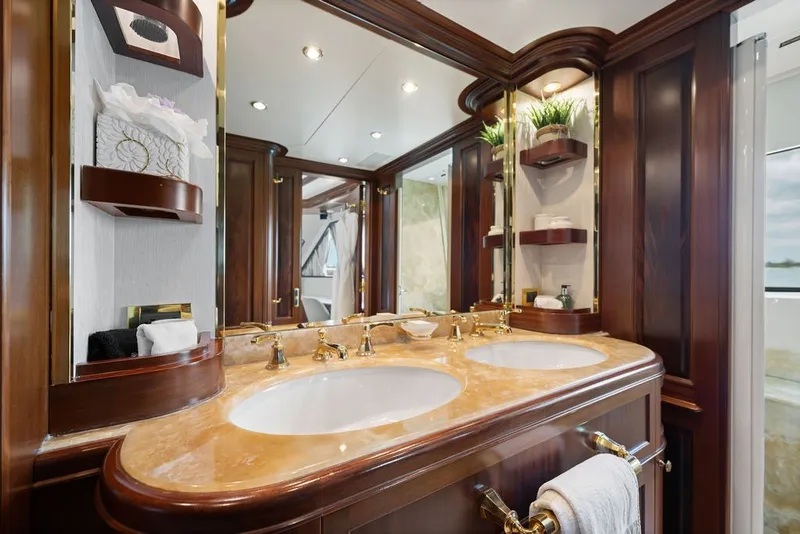 Slide: The Image of Luxurious bathroom on 2007 Benetti 120 Classic yacht with dual sinks and elegant wood finishes. - 108