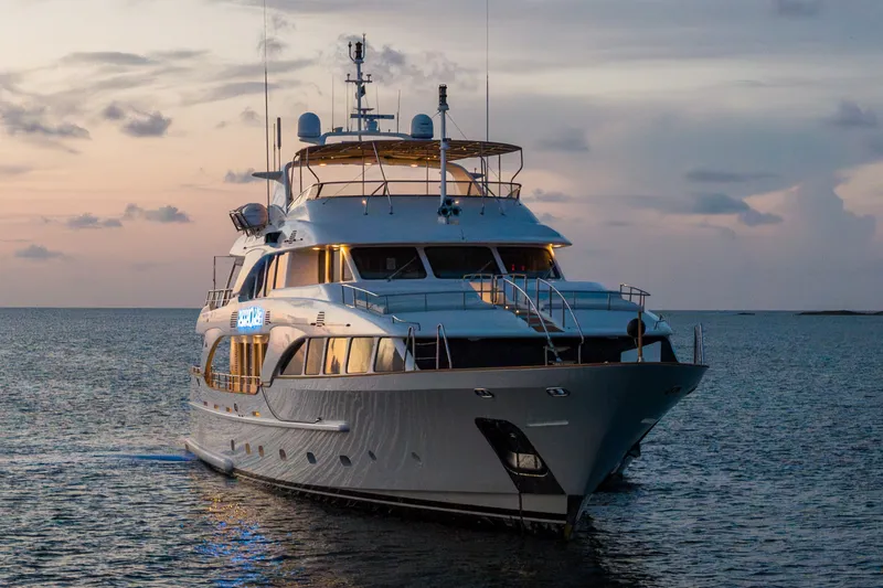 Slide: The Image of Luxury yacht Benetti 120 Classic 2007 cruising at sunset on calm waters. - 16