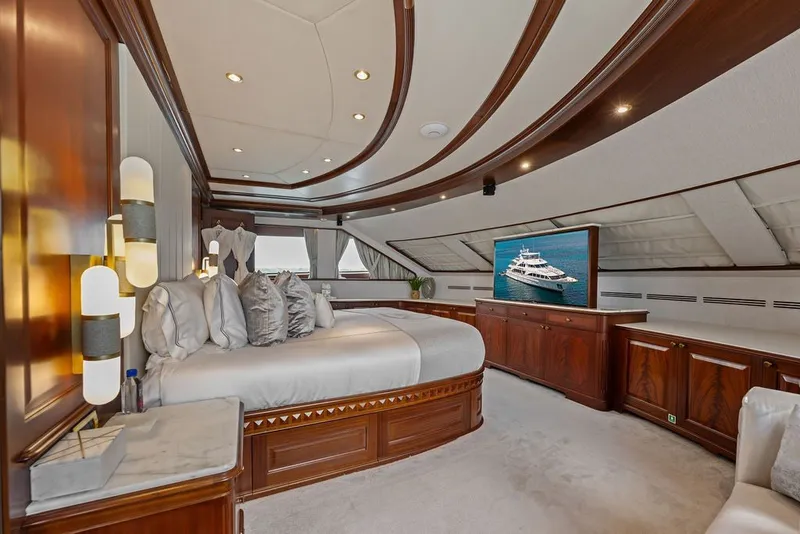 Slide: The Image of Luxurious bedroom interior of 2007 Benetti 120 Classic yacht with elegant wood finishes. - 97