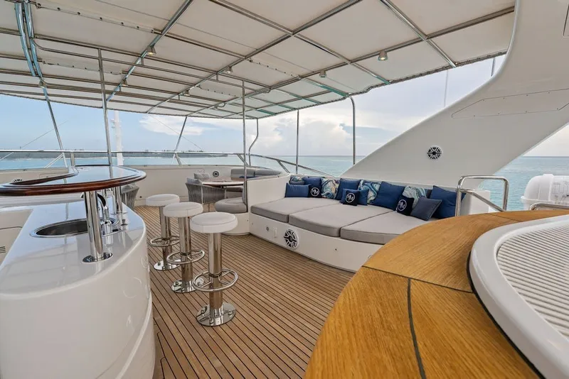 Slide: The Image of Luxurious deck of 2007 Benetti 120 Classic yacht with seating and bar area. - 46