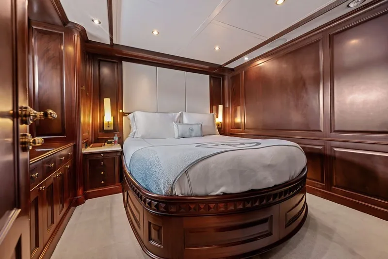 Slide: The Image of Luxurious bedroom with elegant wood paneling on a 2007 Benetti 120 Classic yacht. - 112