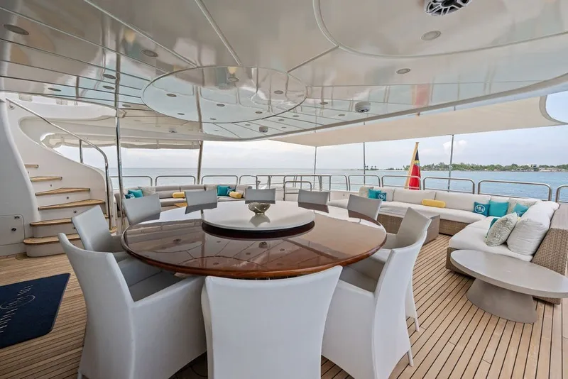 Slide: The Image of Luxurious deck of 2007 Benetti 120 Classic yacht with elegant seating and ocean view. - 30