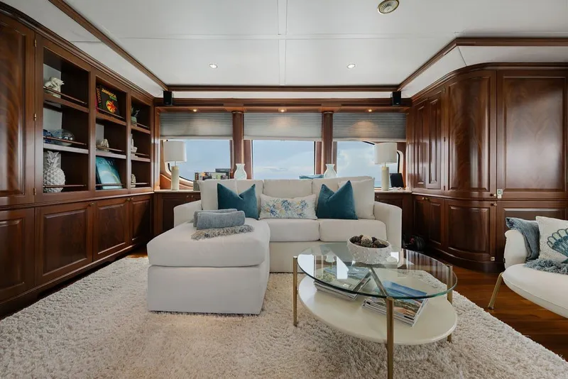 Slide: The Image of Luxurious interior of 2007 Benetti 120 Classic yacht with elegant wood paneling and plush seating. - 84