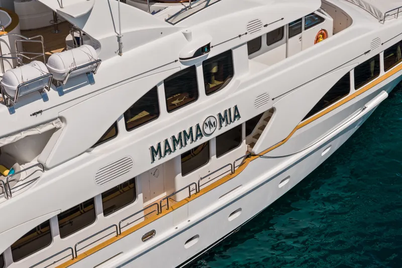 Slide: The Image of Luxury yacht "Mamma Mia," Benetti 120 Classic, 2007, docked on clear blue water. - 8
