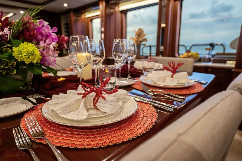Slide: The Image of Elegant dining setup on 2007 Benetti 120 Classic yacht with ocean view. - 151