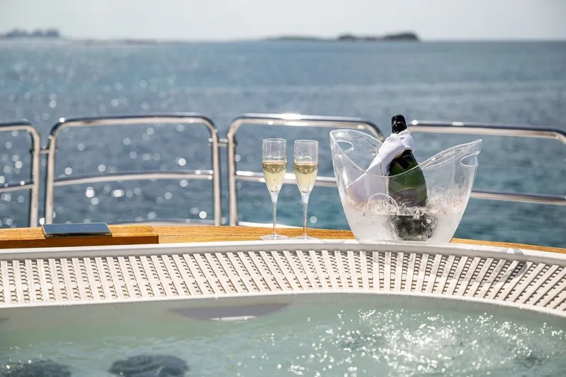 Slide: The Image of Luxury yacht Benetti 120 Classic 2007 with champagne and ocean view. - 45