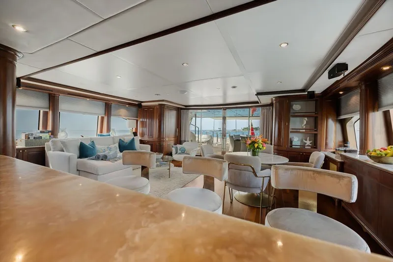 Slide: The Image of Luxurious interior of a 2007 Benetti 120 Classic yacht with elegant seating and decor. - 89