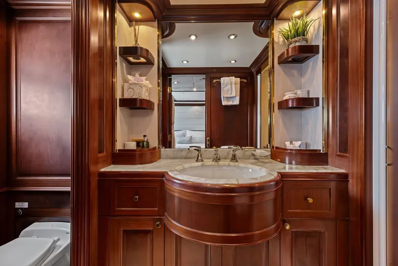 Slide: The Image of Luxurious wooden bathroom interior on a 2007 Benetti 120 Classic yacht. - 129
