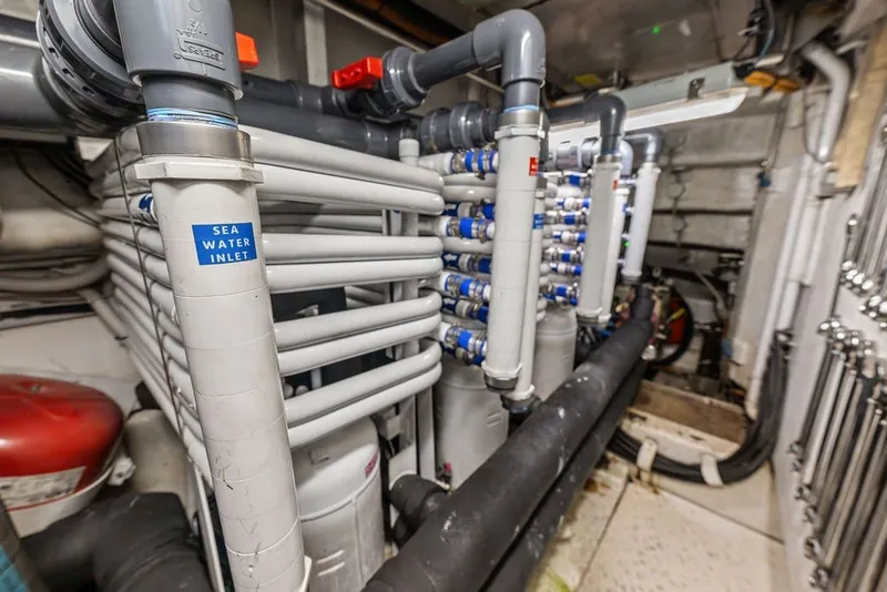 Slide: The Image of Engine room of 2007 Benetti 120 Classic yacht with seawater inlet pipes. - 162