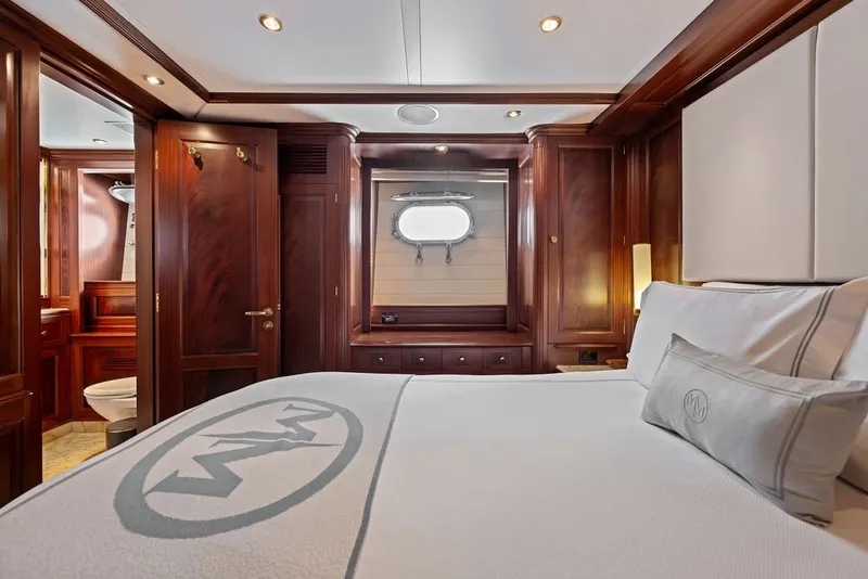 Slide: The Image of Luxurious cabin interior of 2007 Benetti 120 Classic yacht with elegant wood finishes. - 124
