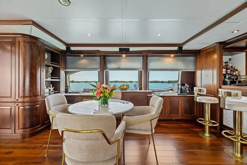 Slide: The Image of Luxurious interior of 2007 Benetti 120 Classic yacht with elegant dining area and ocean view. - 81