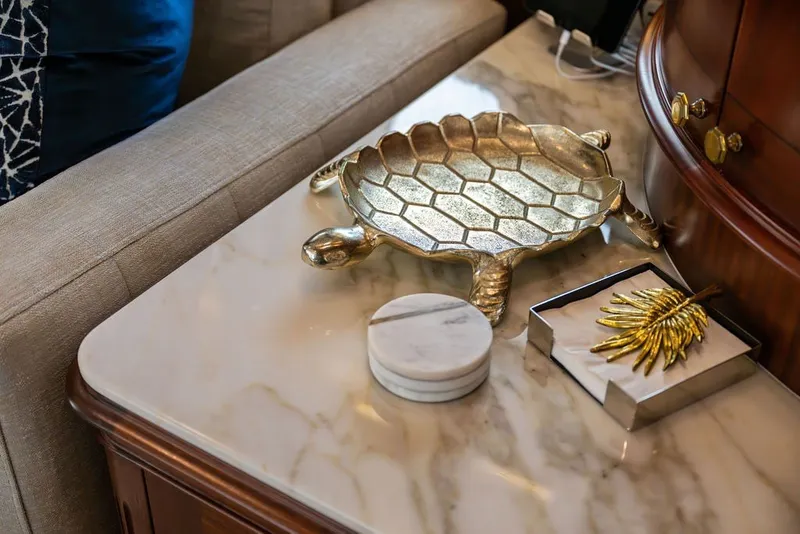 Slide: The Image of Luxurious marble table with decorative turtle tray on Benetti 120 Classic yacht, 2007 model. - 140