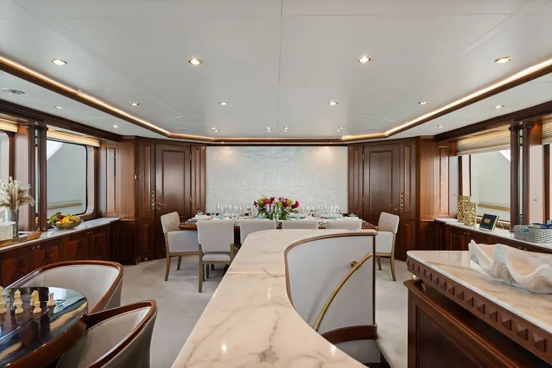 Slide: The Image of Luxurious interior of 2007 Benetti 120 Classic yacht with elegant dining area. - 60