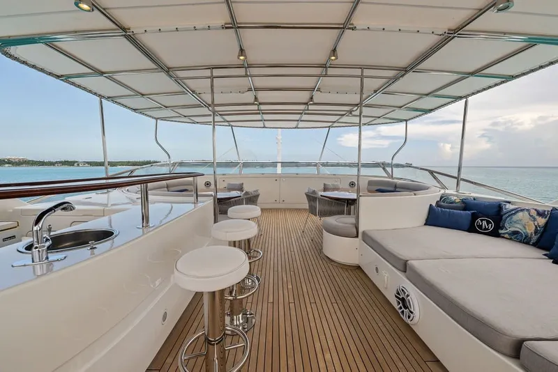 Slide: The Image of Luxurious deck of 2007 Benetti 120 Classic yacht with seating and ocean view. - 42