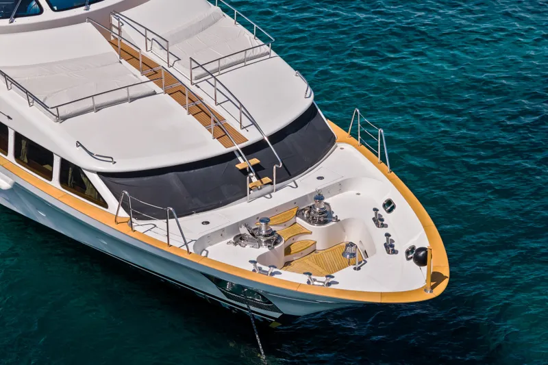 Slide: The Image of Luxury yacht Benetti 120 Classic 2007 on clear blue water. - 9