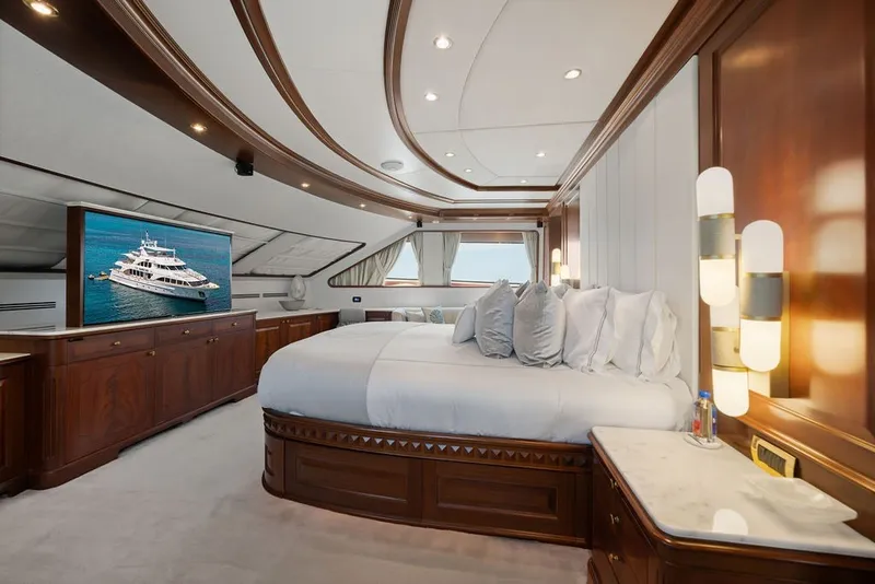 Slide: The Image of Luxurious bedroom interior of 2007 Benetti 120 Classic yacht with elegant wood finishes. - 101