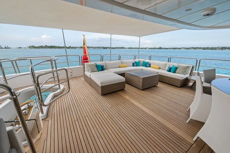 Slide: The Image of Luxurious deck of 2007 Benetti 120 Classic yacht with ocean view and elegant seating. - 34