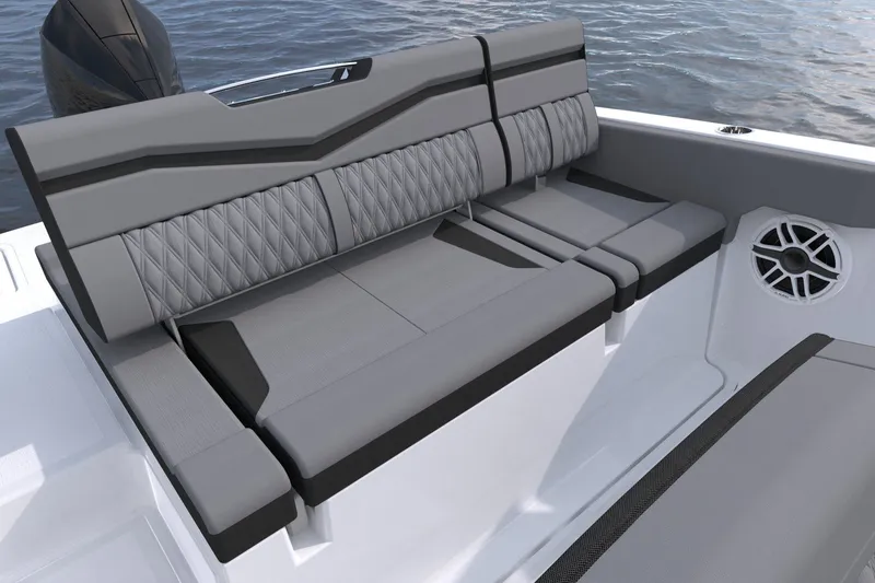 Slide: The Image of Manufacturer Provided Image: 2027 Monterey Elite 23 OB boat interior with stylish gray seating and speaker detail. - 7