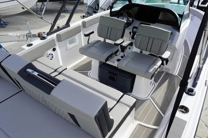 Slide: The Image of 2027 Monterey Elite 23 OB boat interior with modern seating and sleek design. - 2