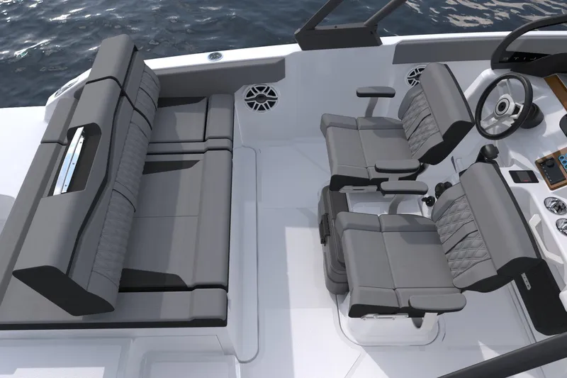 Slide: The Image of Manufacturer Provided Image: Interior of 2027 Monterey Elite 23 OB boat with gray seating and steering wheel. - 6