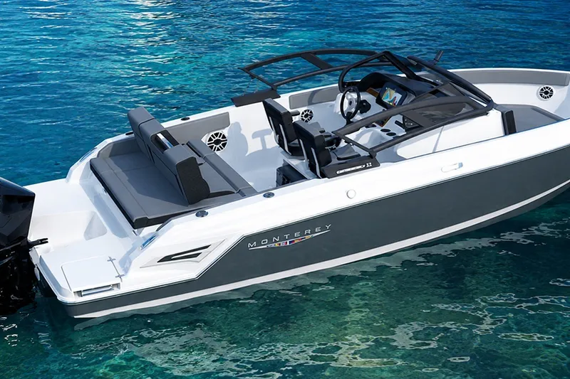 The Image of 2027 Monterey Elite 23 OB boat on clear blue water, showcasing sleek design and modern features. - 0