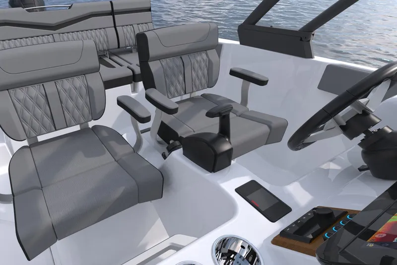 Slide: The Image of Manufacturer Provided Image: Interior of 2027 Monterey Elite 23 OB boat with modern seating and controls. - 5