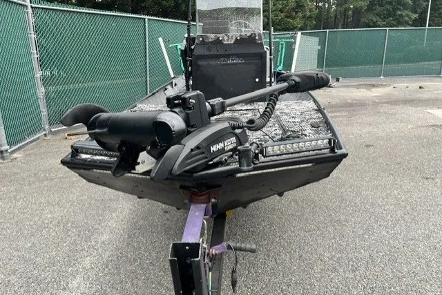 Slide: The Image of 1995 Lowe L1648 Jon boat with Minn Kota trolling motor on trailer. - 4