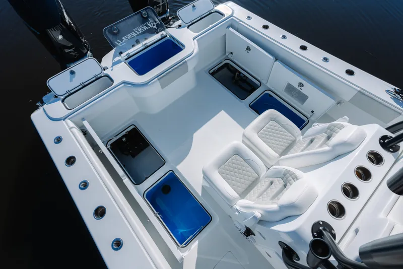 Slide: The Image of 2023 Freeman 34VH boat interior with seating and storage compartments. - 26
